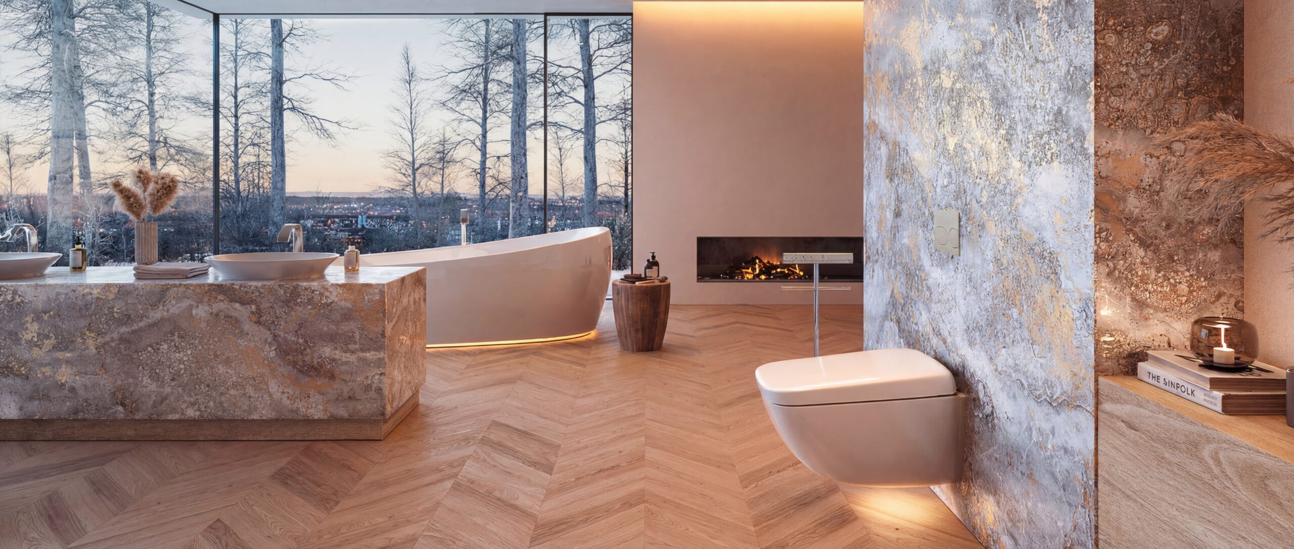 Luxuriöses Badezimmer mit raumhoher Glasfront, die den Blick auf eine winterliche Landschaft und eine Stadt bei Dämmerung freigibt. Im Badezimmer befinden sich ein Doppelwaschtisch aus marmoriertem Stein, eine freistehende, organisch geformte Badewanne mit umlaufender Beleuchtung und ein wandhängendes WC. Die Wände sind teils in gold-grauer Textur gestaltet, der Boden ist ein Fischgrätparkett. Ein Kamin sorgt für Atmosphäre. Diese Einrichtung dient als beeindruckendes Beispiel für Graf Referenzen.